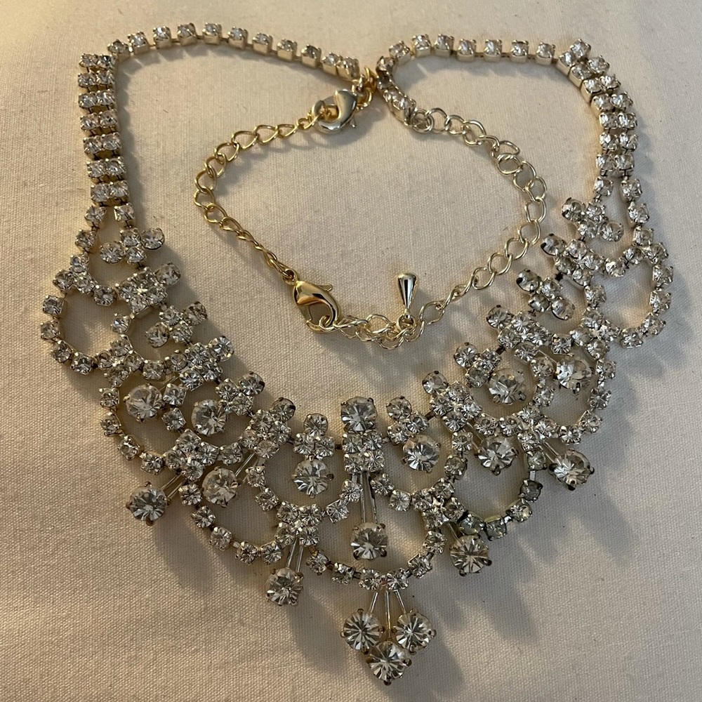 Diamond necklace on silver-tone chain complimenting necklace for a night out